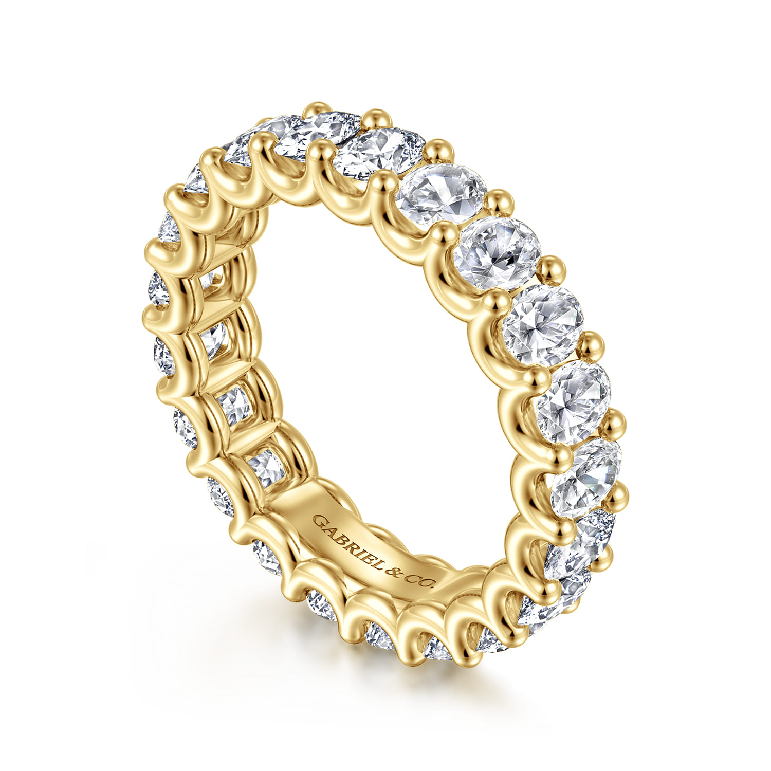 Eternity Band Wedding Ring in 14k Yellow Gold with Oval Natural Diamond at Gabriel & Co. - Shot 3