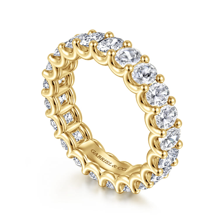 Eternity Band Wedding Ring in 14k Yellow Gold with Oval Natural Diamond at Gabriel & Co. - Shot 3