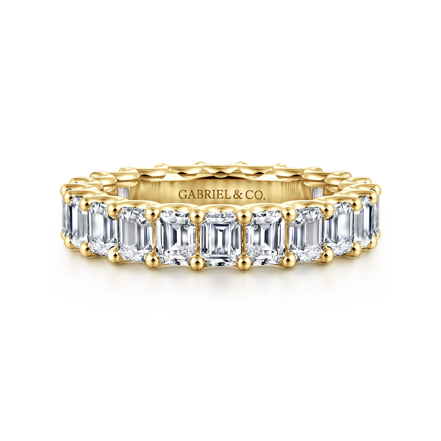 Eternity Band Wedding Ring in 14k Yellow Gold with Emerald Cut Natural Diamond at Gabriel & Co. - Shot 1