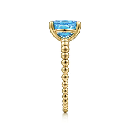 Promise Ring - 14K Yellow Gold Bujukan Oval Swiss Blue Topaz Bujukan Ring