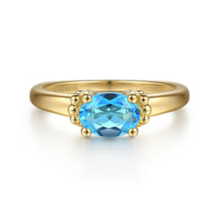 Promise Ring - 14K Yellow Gold Bujukan Oval Swiss Blue Topaz Bujukan Ring