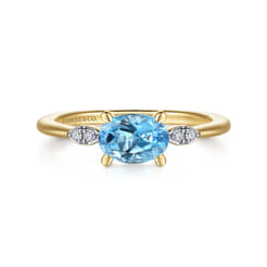 Promise Ring - 14K Yellow Gold Oval Blue Topaz and Diamond Promise Ring