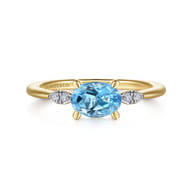 Promise Ring - 14K Yellow Gold Oval Blue Topaz and Diamond Promise Ring