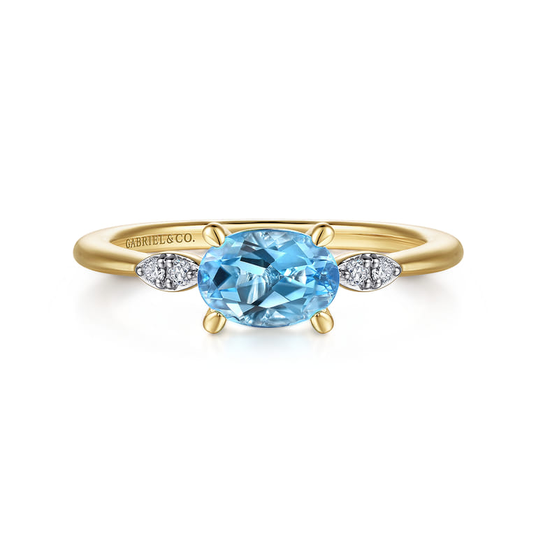 Promise Ring - 14K Yellow Gold Oval Blue Topaz and Diamond Promise Ring - 0.04 ct - Shot 1