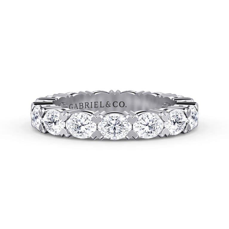 Eternity Band Wedding Ring in 14k White Gold with Oval Natural Diamond at Gabriel & Co. - Shot 1