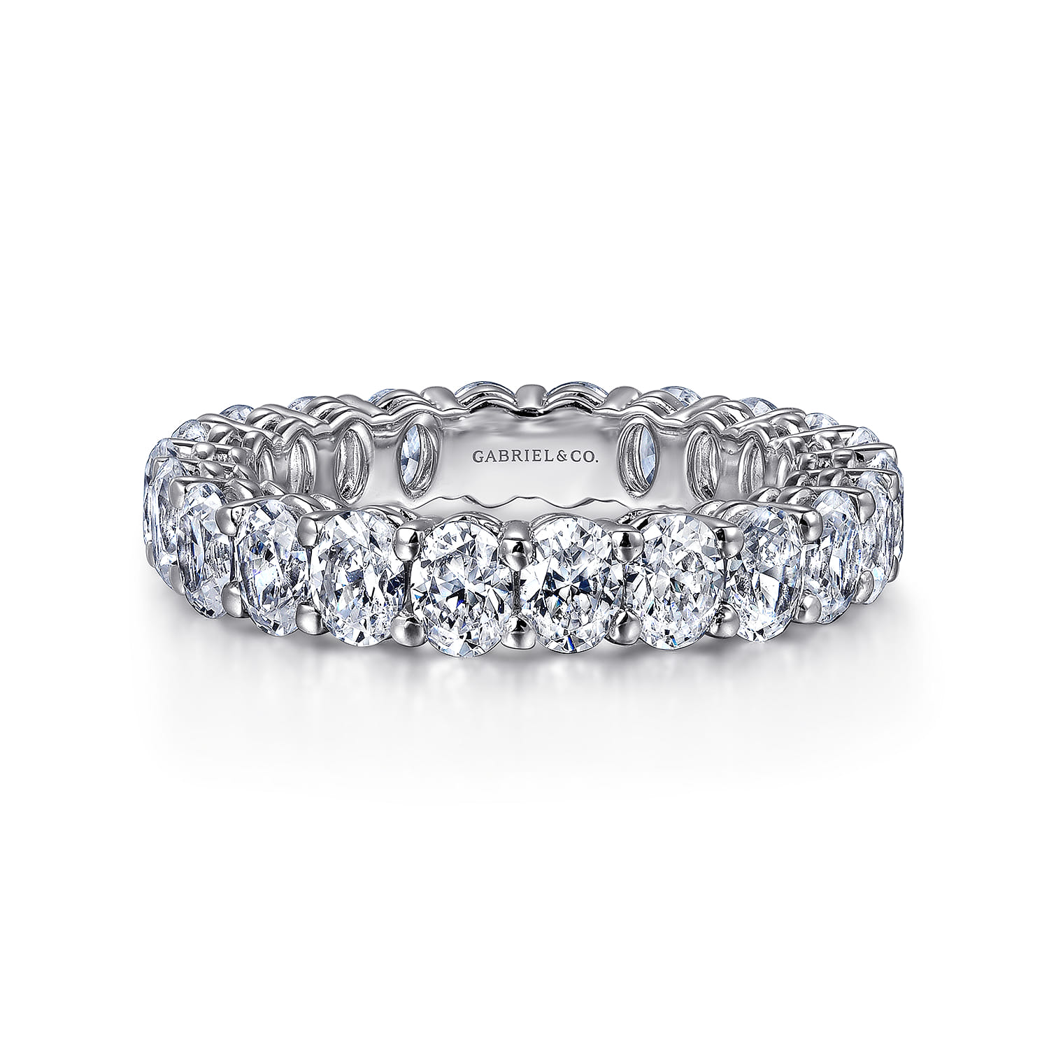 Eternity Band Wedding Ring in 14k White Gold with Oval Natural Diamond at Gabriel & Co. - Shot 1