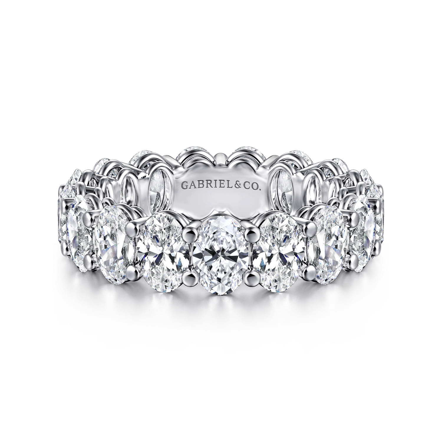 Eternity Band Wedding Ring in 14k White Gold with Oval Natural Diamond at Gabriel & Co. - Shot 1