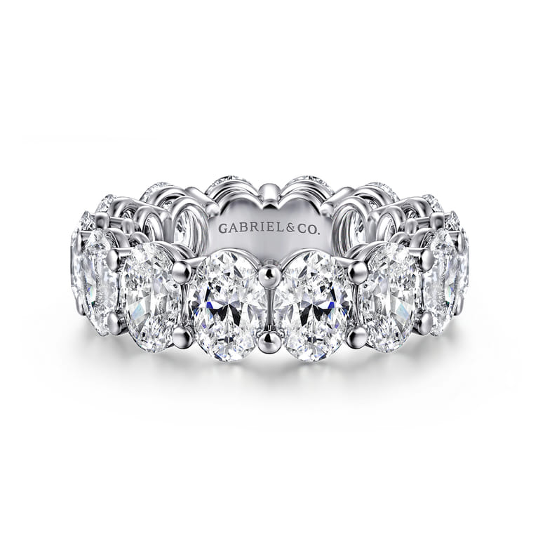 Eternity Band Wedding Ring in 14k White Gold with Oval Natural Diamond at Gabriel & Co. - Shot 1
