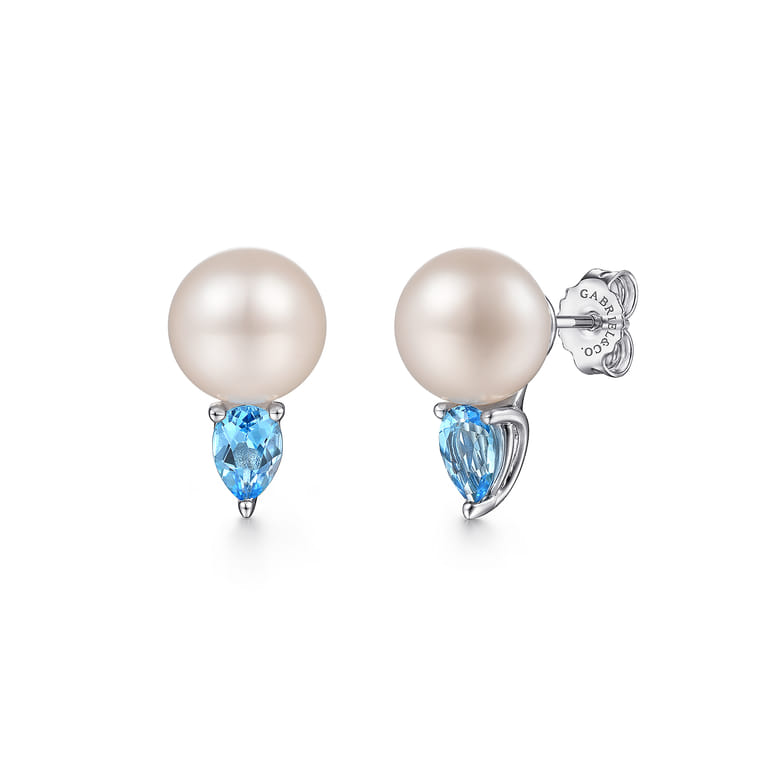 Sterling Silver Mother of Pearl and Blue Topaz Stud Earrings - Shot 1
