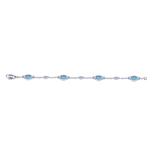 Sterling Silver Twisted Chain Bracelet with Oval Blue Topaz Stations - Shot 3