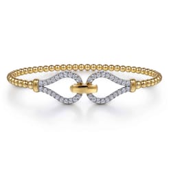 Strides - 14K Yellow Gold Diamond Stirrup Bangle