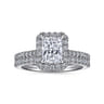 Idina - 14K White Gold Halo Rectangular Radiant Cut Diamond Engagement Ring - 0.34 ct