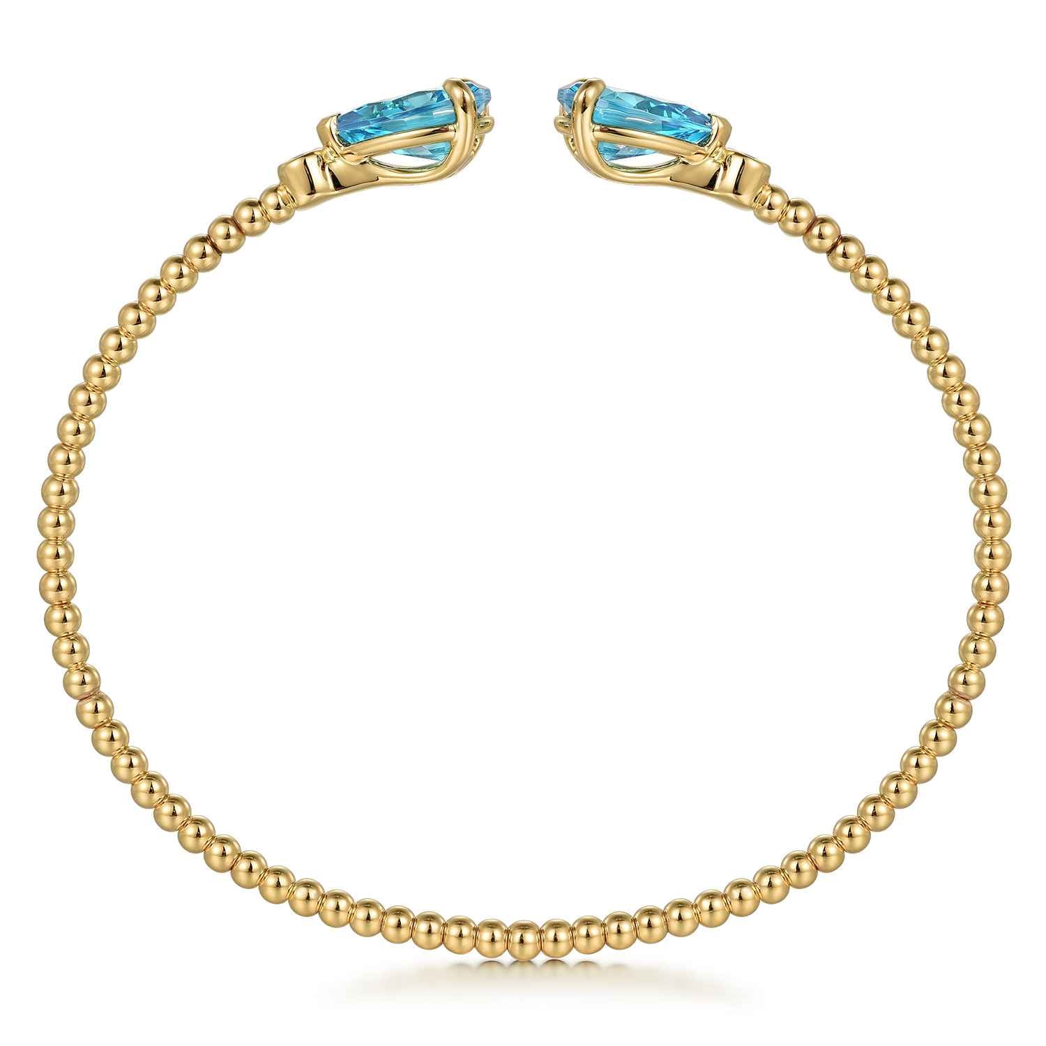Diamond and Pear Shape Blue Topaz Bujukan Bangle in 14K Yellow Gold, photograph 3