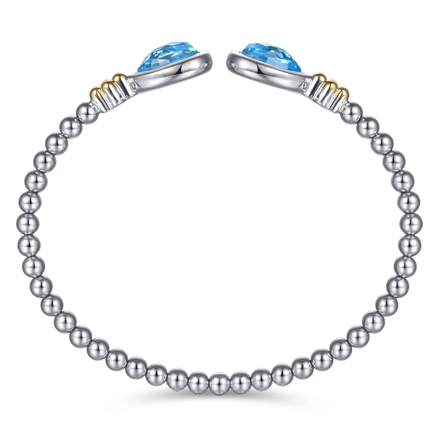and Bujukan Pear Blue Topaz Bangle in 14K Yellow Gold, photograph 3