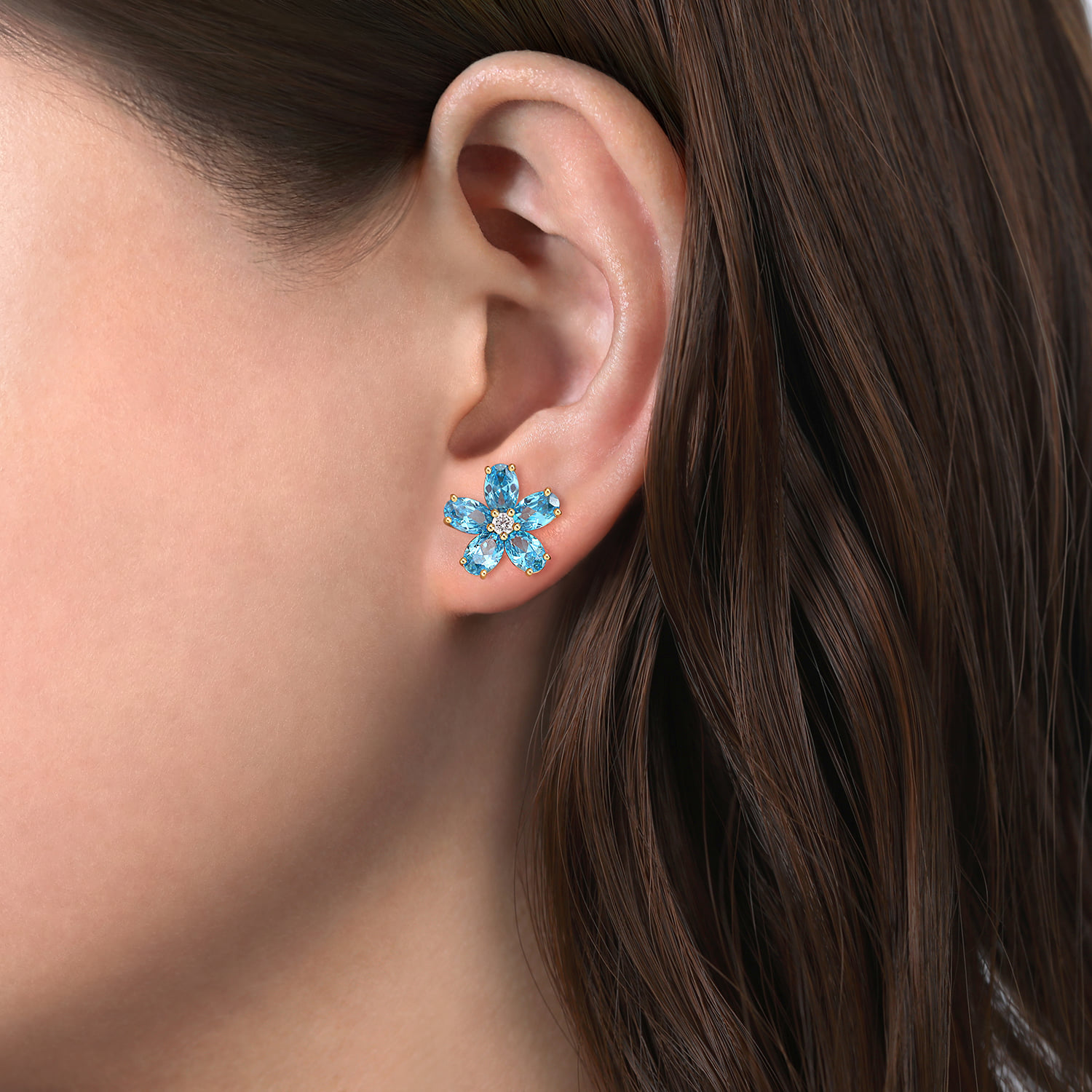 Diamond and Blue Topaz Flower Stud Earrings in 14K Yellow Gold, photograph 2