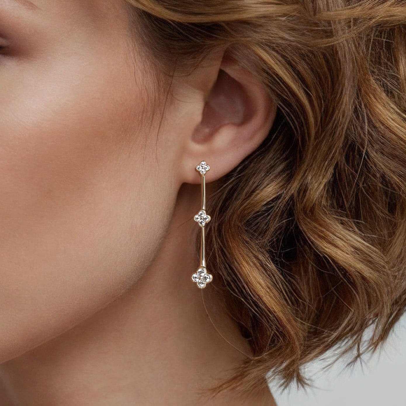 Graduating Diamond Clover Stud Drop Earrings in 14K Yellow Gold, photograph 4