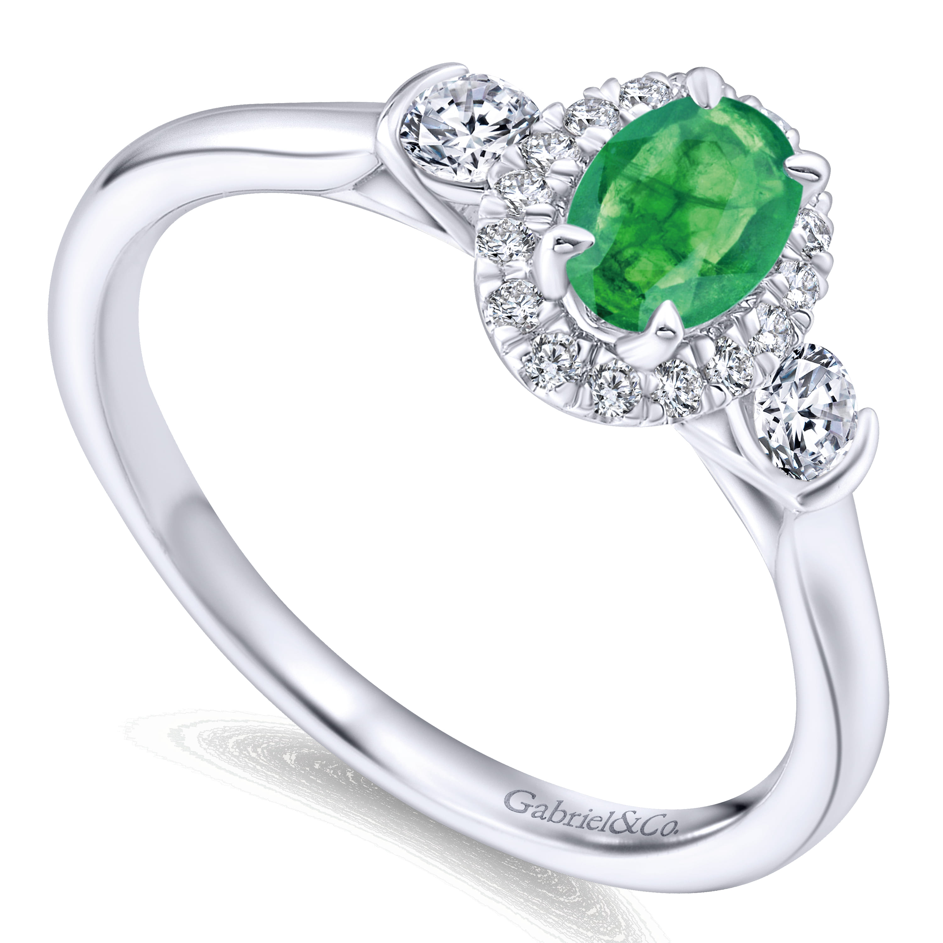 Oval Emerald and Diamond Halo Three Stone Ring in 14K White Gold, photograph 3