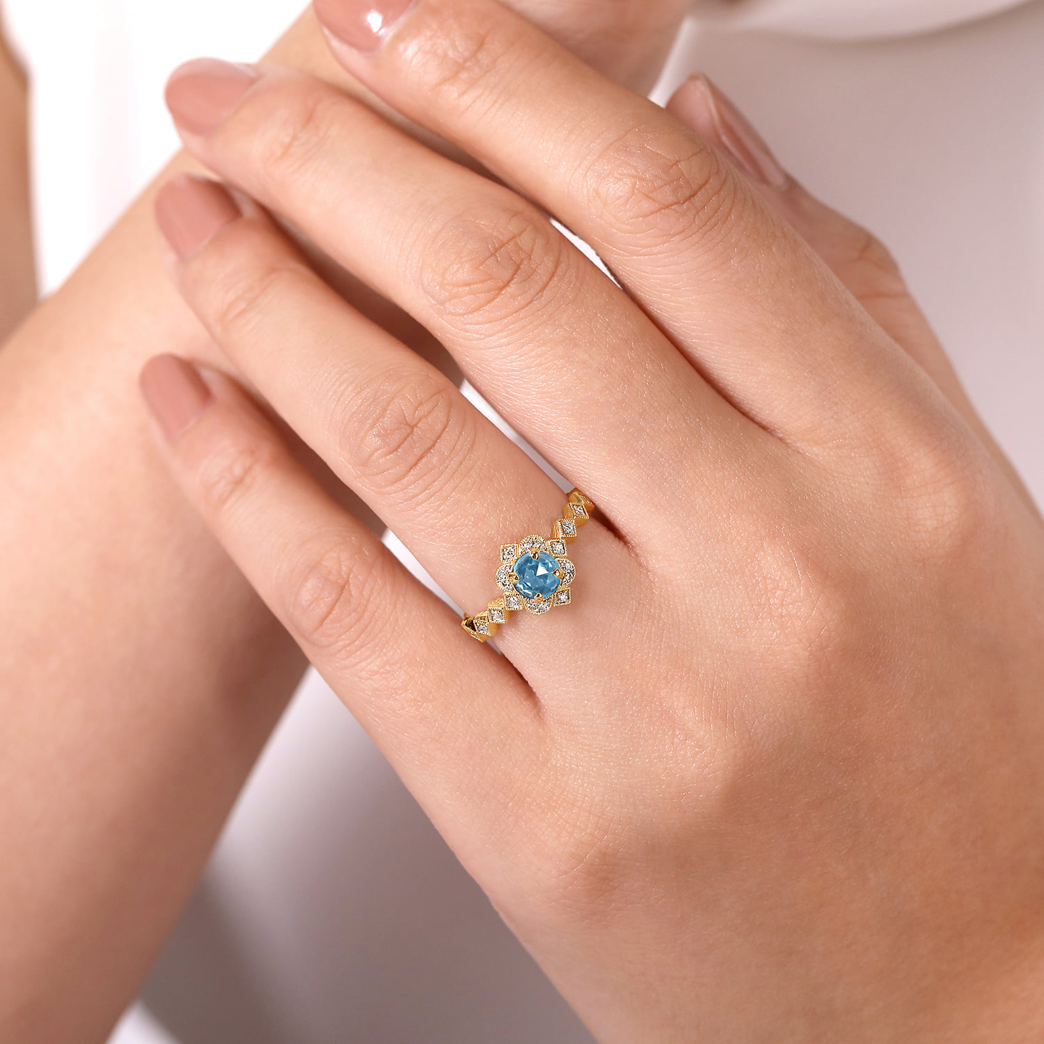 Round Blue Topaz and Diamond Halo Ring in 14K Yellow Gold, photograph 5