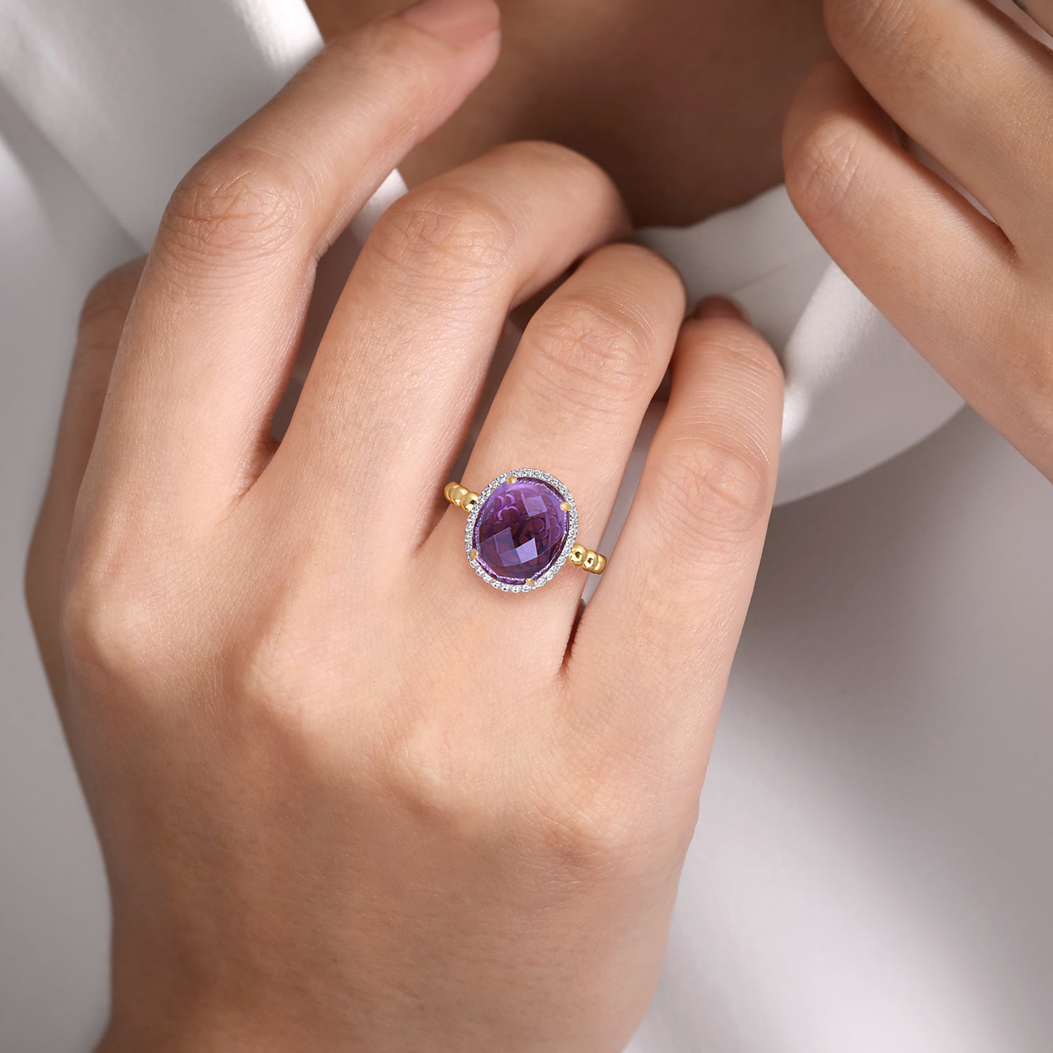 Oval Amethyst and Diamond Halo Ring in 14K Yellow Gold, photograph 5
