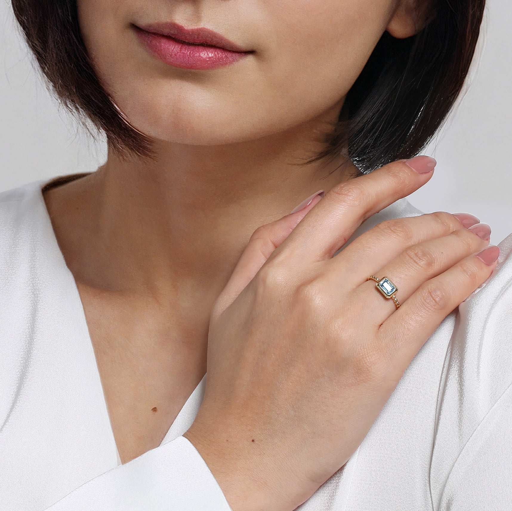 Emerald Cut Blue Topaz Bujukan Promise Ring in 14K Yellow Gold, photograph 6