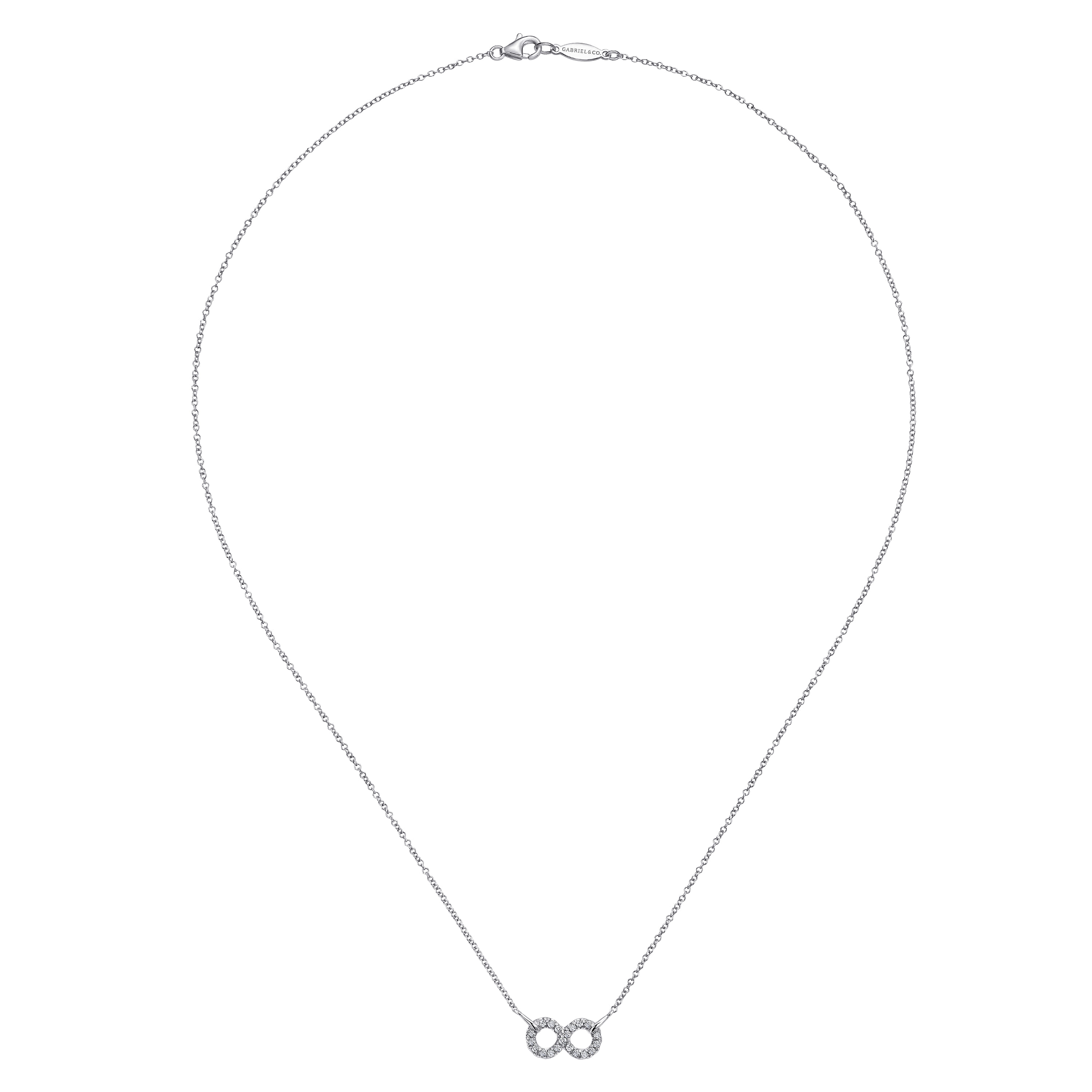 White Sapphire Infinity Symbol Pendant Necklace in Sterling Silver, photograph 2