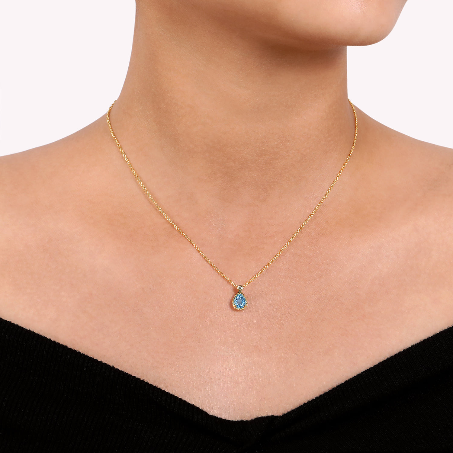 Blue Topaz Teardrop Pendant Necklace with Bezel Set Diamond in 14K Yellow Gold, photograph 3