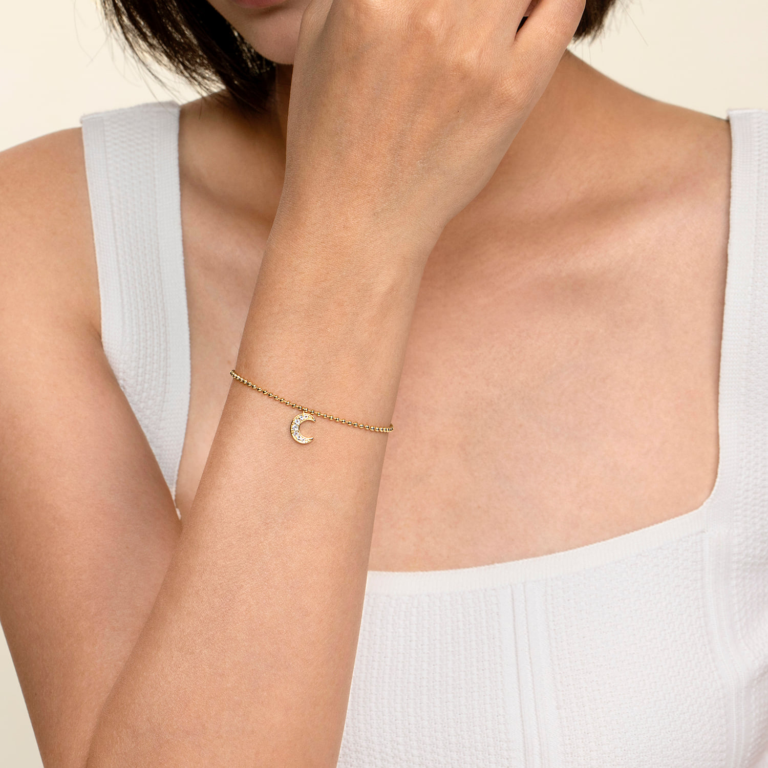 Bujukan and White Sapphire Moon Charm Bracelet in 14K Yellow Gold, photograph 3