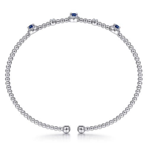 14K White Gold Bujukan Sapphire and Diamond Halo Bangle 14K White Gold Bujukan Sapphire and Diamond Halo Bangle