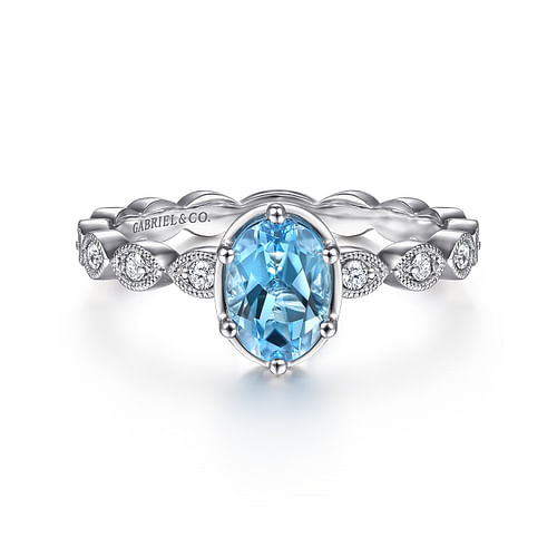 14K White Gold Oval Blue Topaz and Diamond Shank Ring