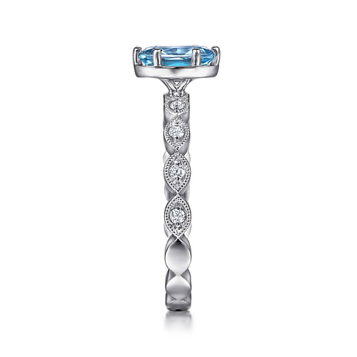 14K White Gold Oval Blue Topaz and Diamond Shank Ring