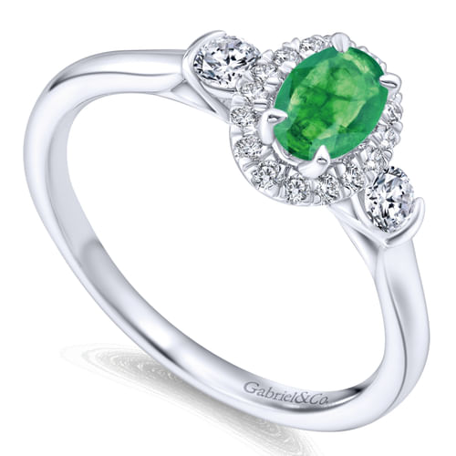 14K White Gold Oval Emerald and Diamond Halo Three Stone Ring
