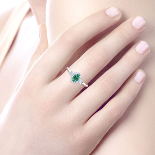 14K White Gold Oval Emerald and Diamond Halo Three Stone Ring