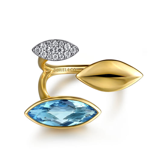 14K White and Yellow Gold Diamond and Marquise Blue Topaz Ladies Ring 14K White and Yellow Gold Diamond and Marquise Blue Topaz Ladies Ring