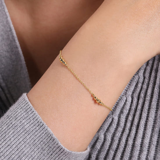 14K Yellow Gold Beaded Stations Bracelet angle 3