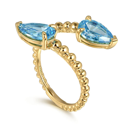 14K Yellow Gold Bujukan Blue Topaz Bypass Ladies Ring