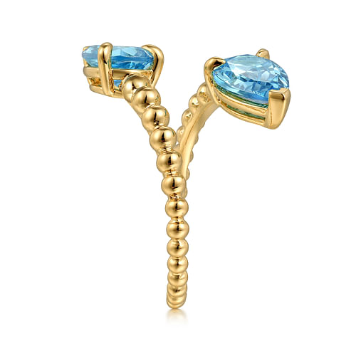 14K Yellow Gold Bujukan Blue Topaz Bypass Ladies Ring