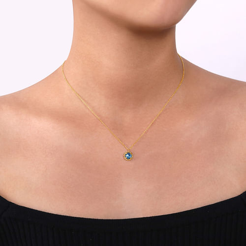 14K Yellow Gold Bujukan Blue Topaz Pendant Necklace