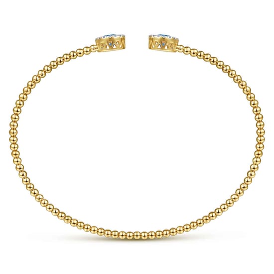 14K Yellow Gold Bujukan Diamond Halo and Blue Topaz Bangle angle 3