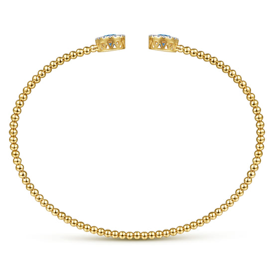 14K Yellow Gold Bujukan Diamond Halo and Blue Topaz Bangle angle 3