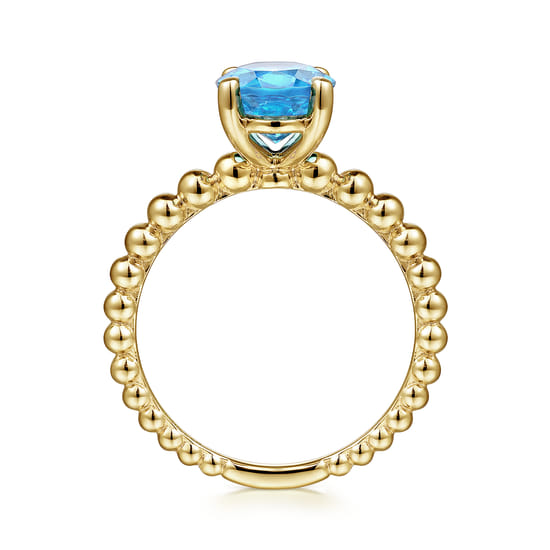 14K Yellow Gold Bujukan Oval Swiss Blue Topaz Bujukan Promise Ring angle 2