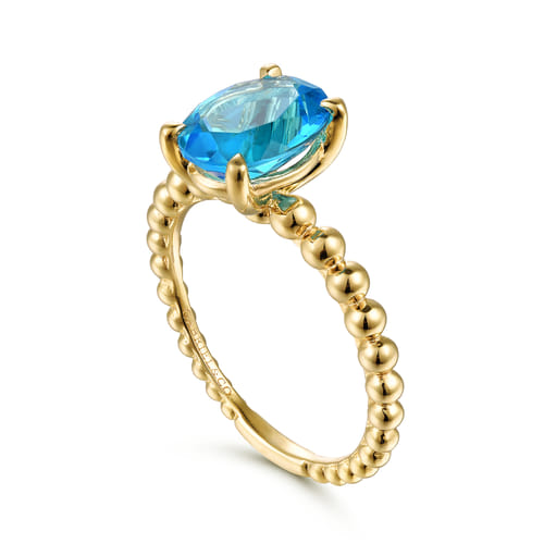 14K Yellow Gold Bujukan Oval Swiss Blue Topaz Bujukan Promise Ring