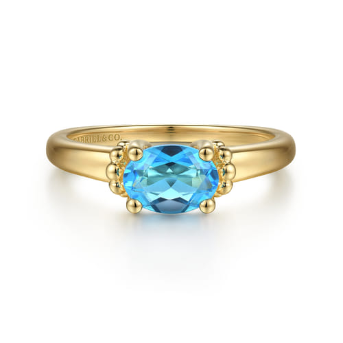 14K Yellow Gold Bujukan Oval Swiss Blue Topaz Bujukan Promise Ring