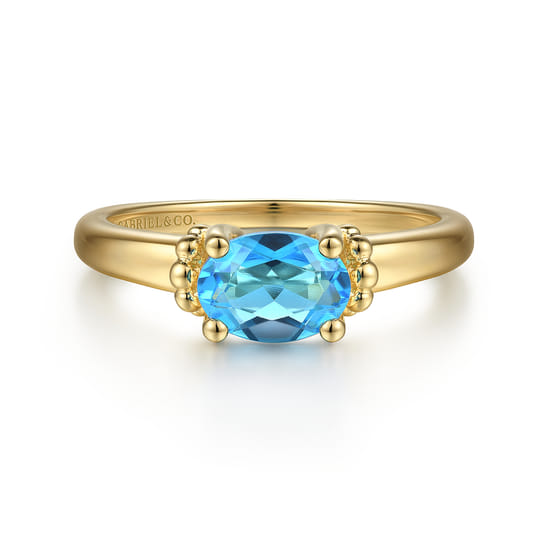 14K Yellow Gold Bujukan Oval Swiss Blue Topaz Bujukan Promise Ring