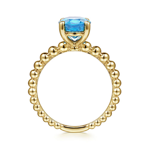 14K Yellow Gold Bujukan Oval Swiss Blue Topaz Bujukan Ring