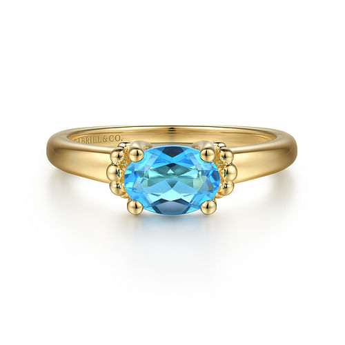 14K Yellow Gold Bujukan Oval Swiss Blue Topaz Bujukan Ring