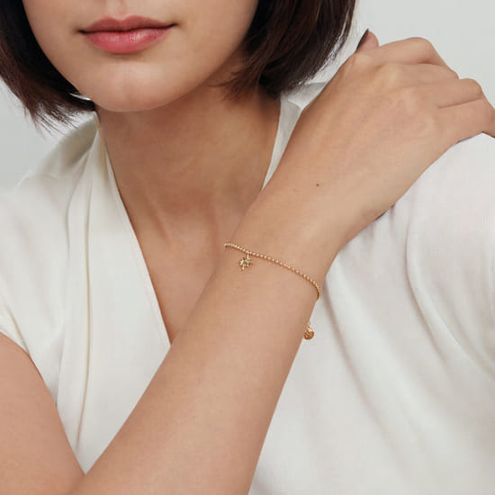 14K Yellow Gold Bujukan Starburst Charm Bracelet angle 4