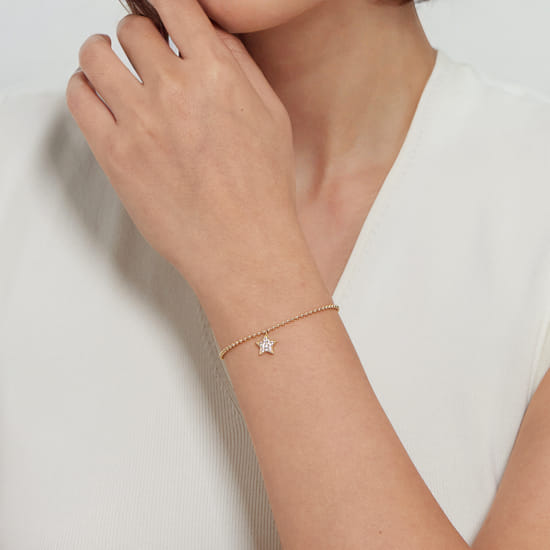 14K Yellow Gold Bujukan and White Sapphire Star Charm Bracelet angle 4 14K Yellow Gold Bujukan and White Sapphire Star Charm Bracelet angle 4