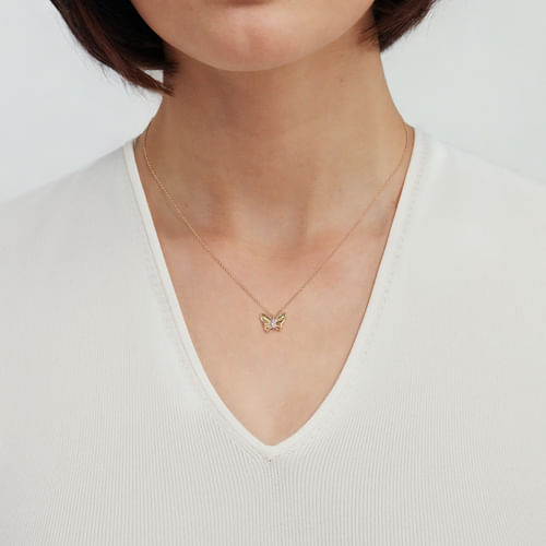 14K Yellow Gold Butterfly Necklace With Diamond Cut Finish And Graduating Diamonds.

