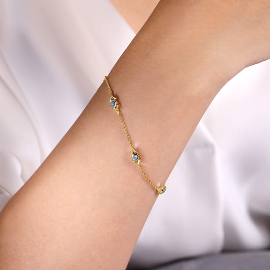 14K Yellow Gold Chain Bracelet with Blue Topaz Triangle Stations angle 3