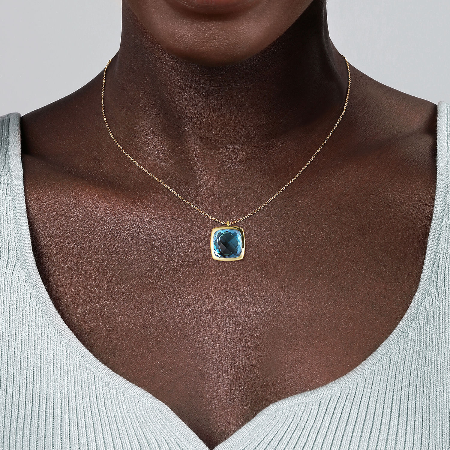 14K Yellow Gold Cushion Cut Blue Topaz Necklace With Flower Pattern J-Back and Bezel Setting